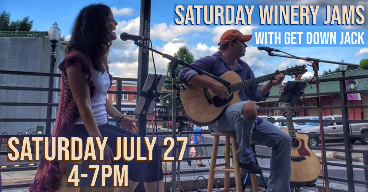 Two musicians perform on an outdoor stage, one singing into a microphone and the other playing an acoustic guitar. The backdrop features a small town setting with cloudy skies. Text on the image reads, "Saturday Winery Jams with Get Down Jack, Saturday July 27, 4-7 PM.