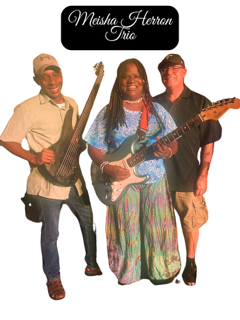 Meisha Herron Band standing together. Trio consists of Meisha Herron on Lead guitar and Vocals, Aaron Clay on Bass and Bryan Coberly on drums.