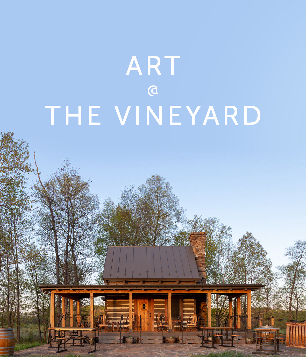 log cabin with Art in the Vineyard written at the top