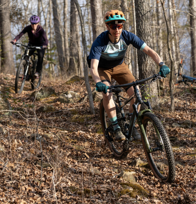 two men mountain biking